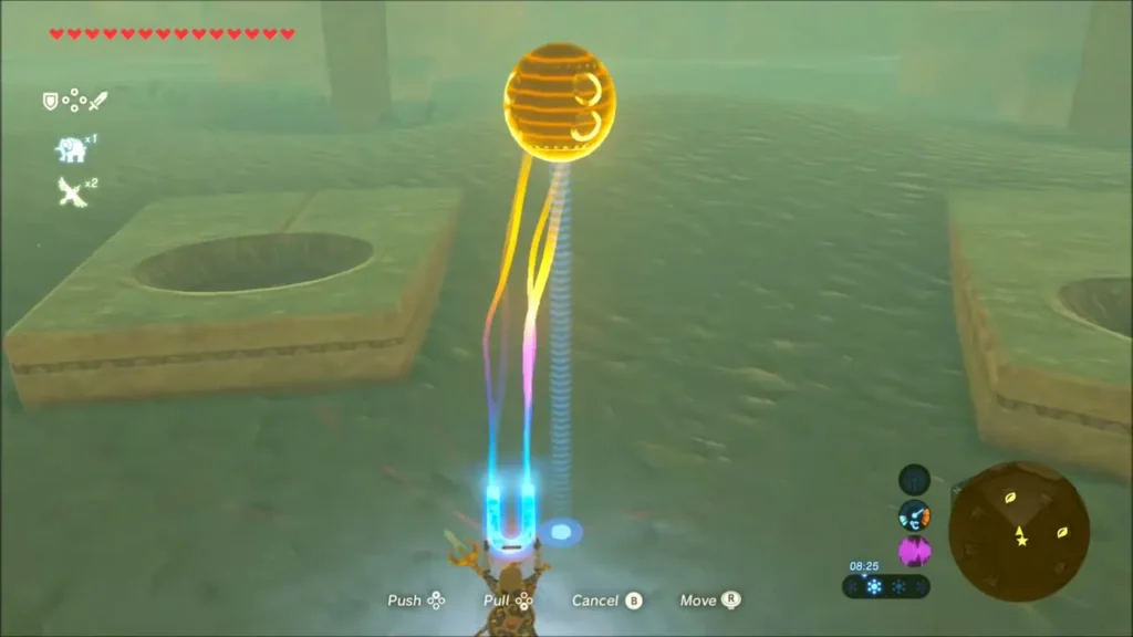 Link using Magnesis to hold a golden orb above sand-filled sockets in the coliseum ruins Link using Magnesis to hold a golden orb above sand-filled sockets in the coliseum ruins