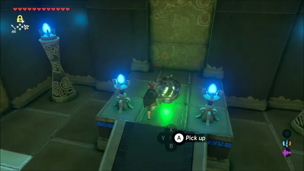 Link about to pick up an electric ball on its pedestal Link about to pick up an electric ball on its pedestal