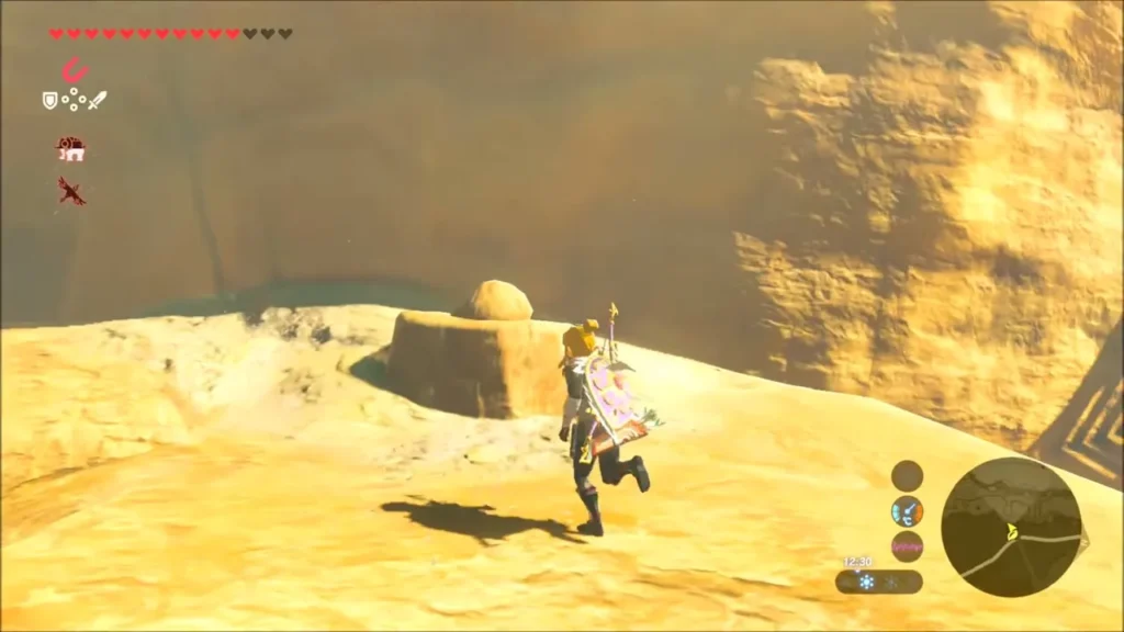 Link running toward a boulder on a cliff ledge Link running toward a boulder on a cliff ledge