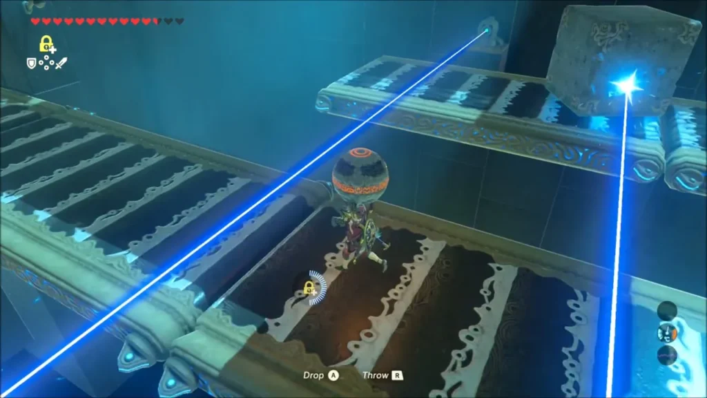 Link holding the sphere between two conveyor belts crossed by laser beams Link holding the sphere between two conveyor belts crossed by laser beams