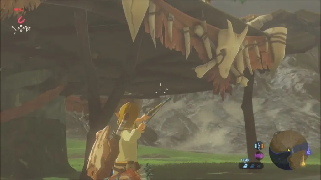 Link aiming his bow up at the Bokoblin lookout under the treehouse platform Link aiming his bow up at the Bokoblin lookout under the treehouse platform
