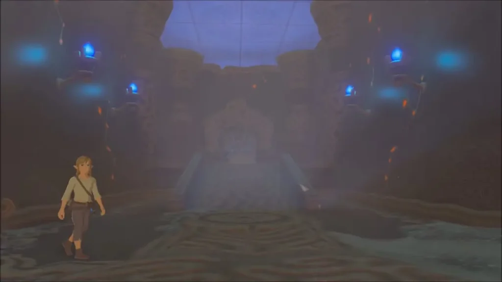 Link walking toward the lit doorway and steps at the end of the chamber Link walking toward the lit doorway and steps at the end of the chamber