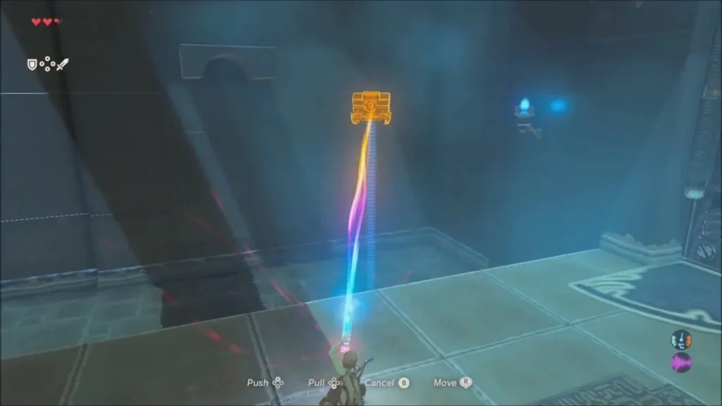 Link pulling a metal chest across the floor with Magnesis inside Oman Au Shrine Link pulling a metal chest across the floor with Magnesis inside Oman Au Shrine