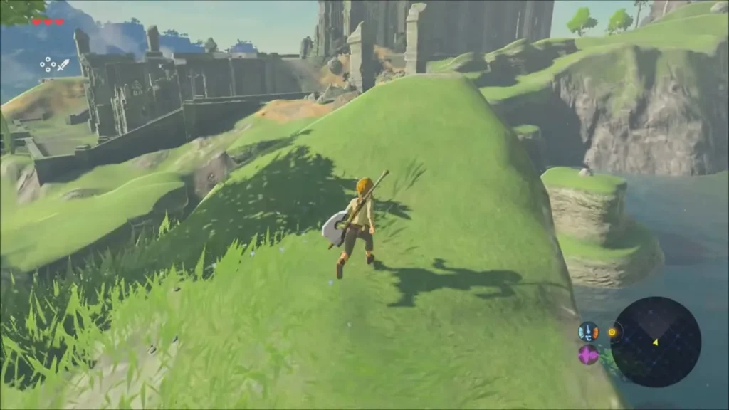 Link running down the grassy slope toward the pond Link running down the grassy slope toward the pond
