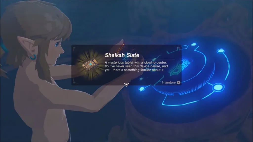 Item box naming the Sheikah Slate as Link holds it above the pedestal Item box naming the Sheikah Slate as Link holds it above the pedestal