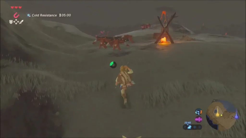 Link approaching a Bokoblin camp with a campfire on the snow Link approaching a Bokoblin camp with a campfire on the snow