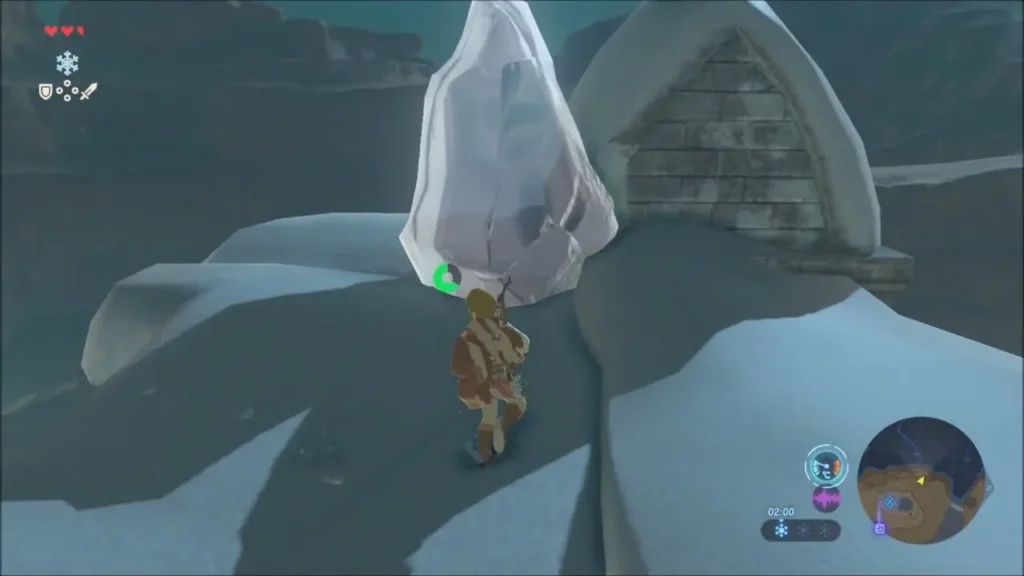 Link facing a block of ice against the wall of a small snow-covered stone hut Link facing a block of ice against the wall of a small snow-covered stone hut