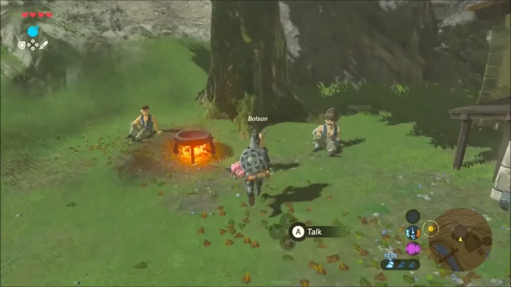 Link approaching Bolson, who sits beside a glowing cooking pot