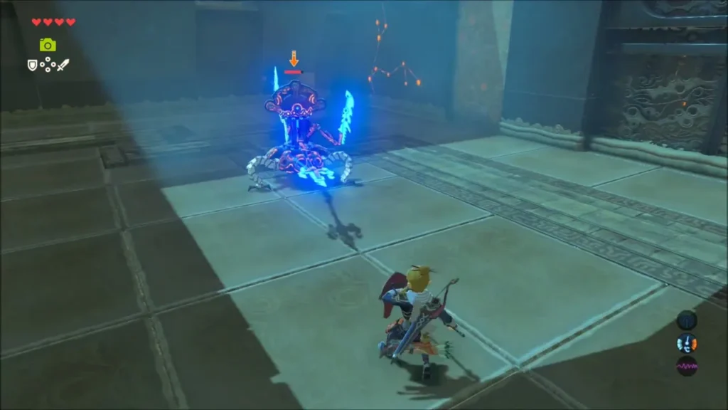 Link circling a Guardian Scout across the stone arena floor