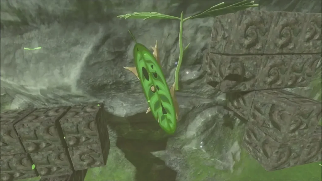 A Korok hanging between the stone cubes after the block is removed