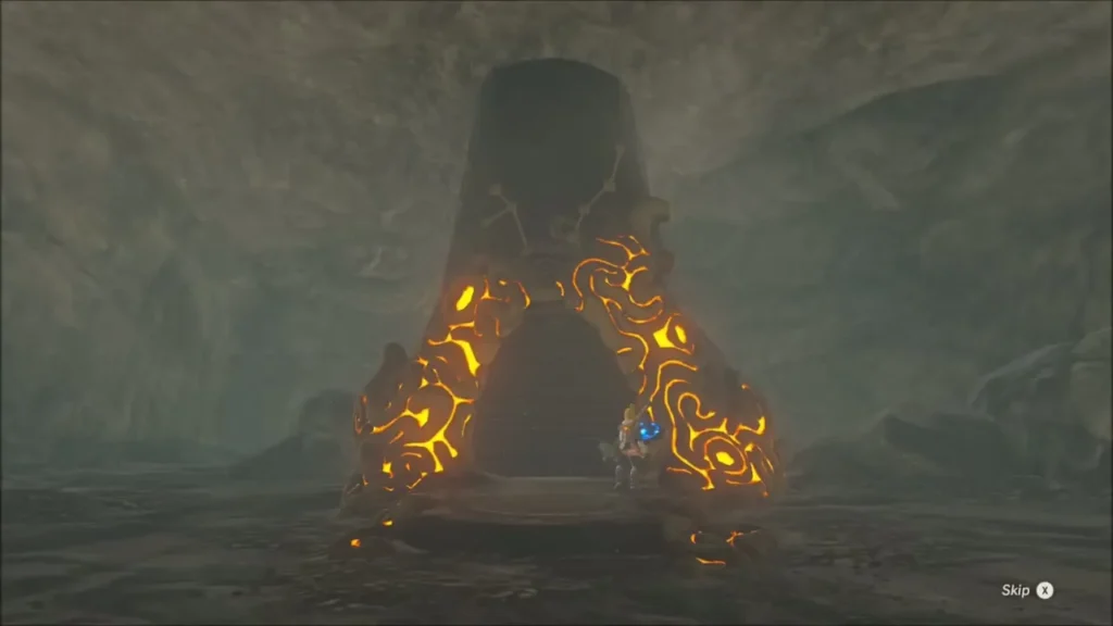 Link before the glowing orange entrance of Dow Na'eh Shrine in the tunnel