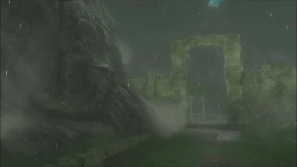 Ruined stone arch of the East Gate on Lanayru Road in rain