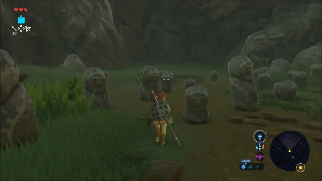 Link walking among the field of stone statues with one glowing in the distance