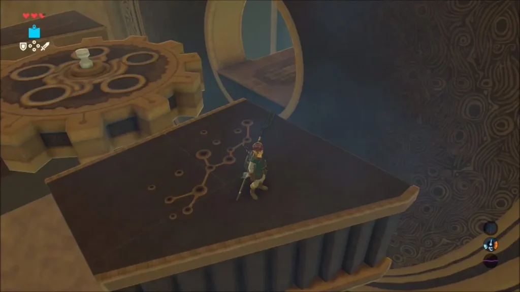 Link on a platform beside a large gear inside the shrine
