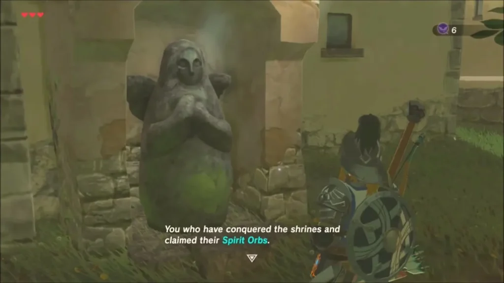 Link praying at the Goddess Statue in Hateno Village with six Spirit Orbs
