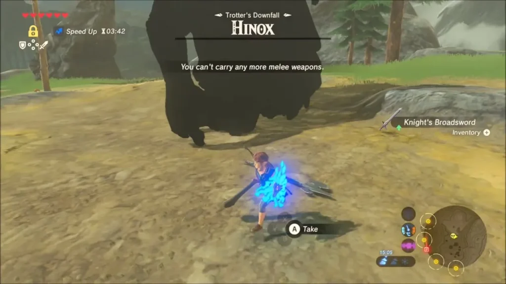 Link picking up a Knights Broadsword from the Hinox camp