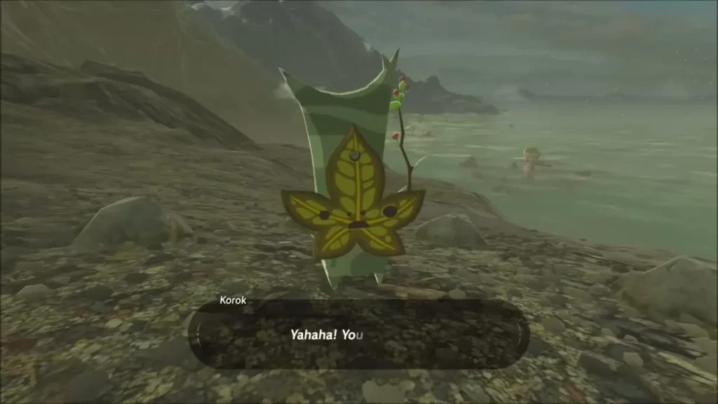 A Korok saying Yahaha on the rocky ridge by the sea