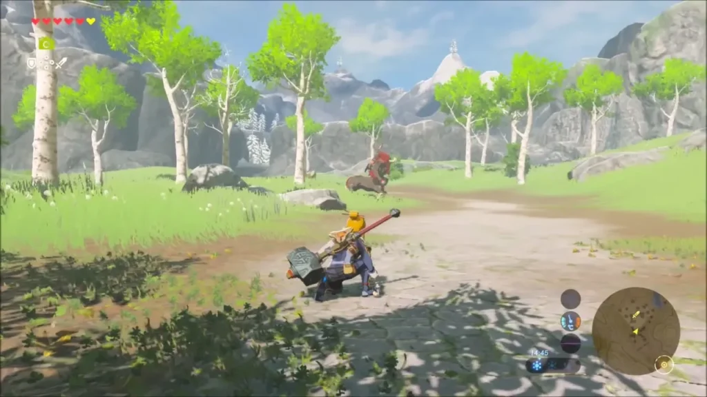 Lynel in the distance on the road with Link crouched in the foreground