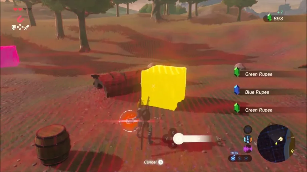 A Magnesis-held crate dropping Rupees near barrels at the Bokoblin camp
