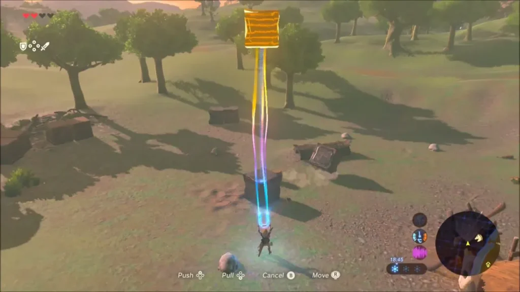 Link using Magnesis to lift a metal crate high into the air at the camp