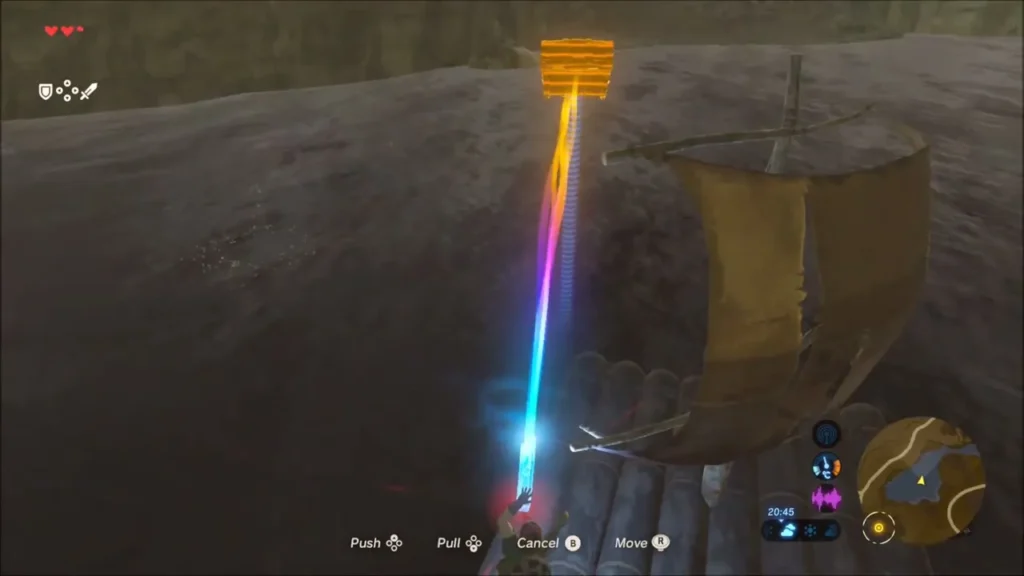 Link using Magnesis to pull a chest toward the raft