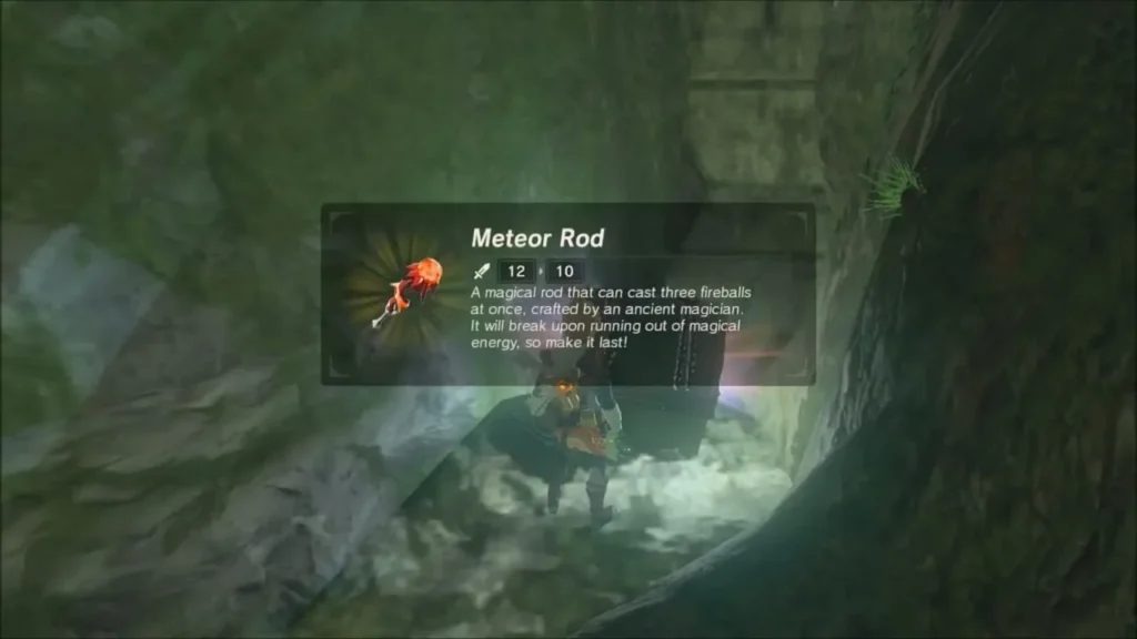 Link holding up the Meteor Rod with its item description
