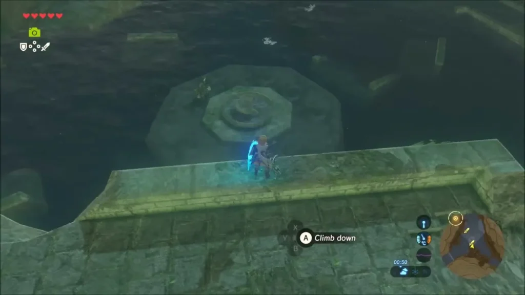 Octagonal stone platform with a ring lying just beneath the water