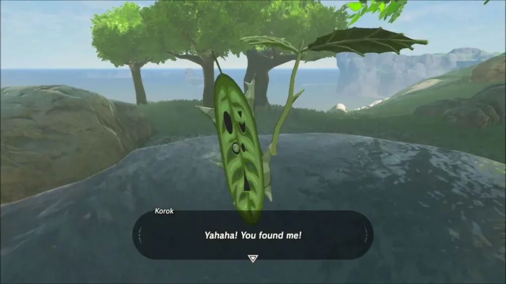 A leaf-faced Korok above the pond water saying you found me