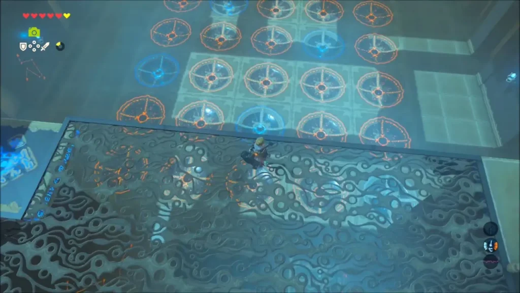 The 5 by 5 grid of bowl-shaped hollows seen from the upper level