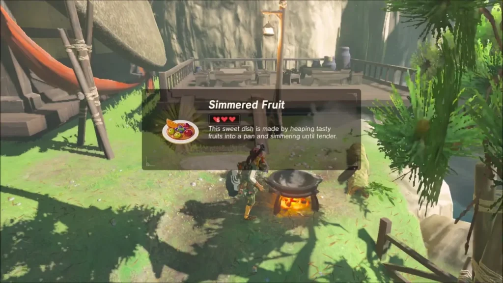 Link cooking Simmered Fruit at the pot, dish name shown