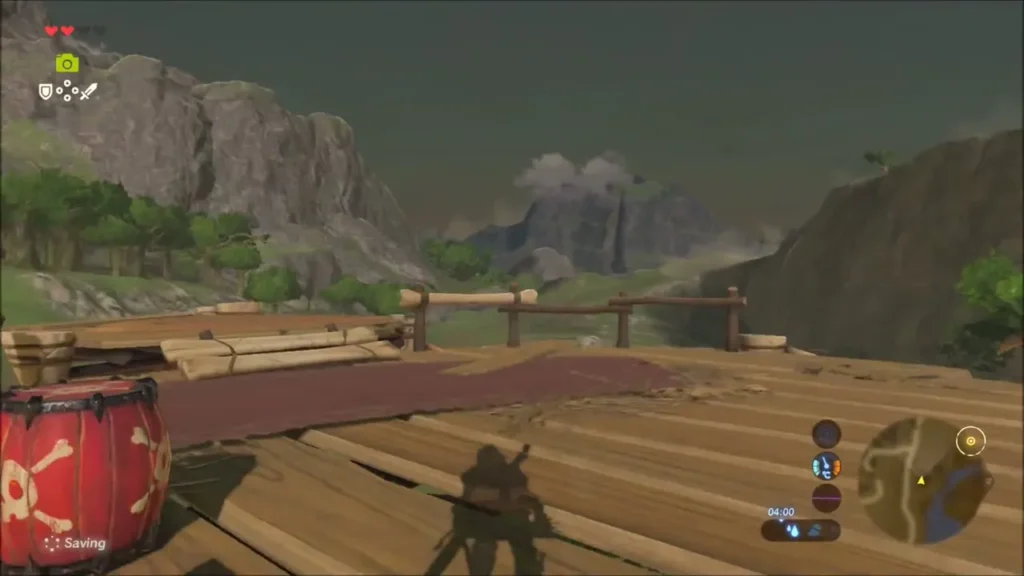 Red skull-marked drum on the highest camp platform