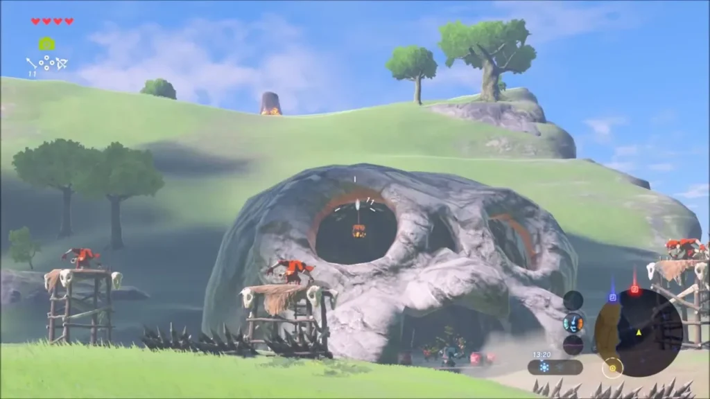 Bokoblin camp built into a giant skull-shaped rock with lookout towers