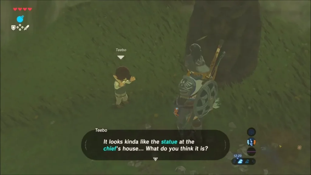 Teebo asking Link what he thinks of the strange statue on the path