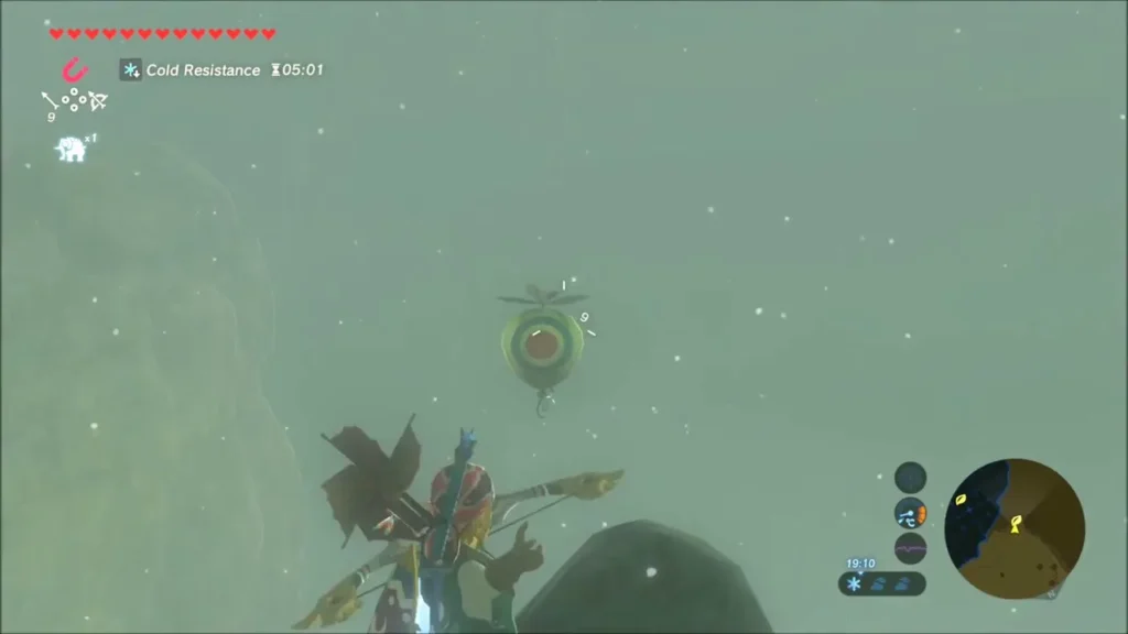 Link aiming his bow at the floating balloon target in the snow Link aiming his bow at the floating balloon target in the snow