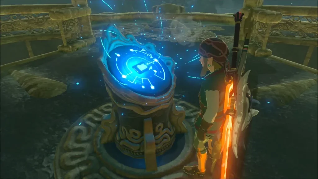 Link placing the Sheikah Slate on the pedestal at the top of the tower Link placing the Sheikah Slate on the pedestal at the top of the tower