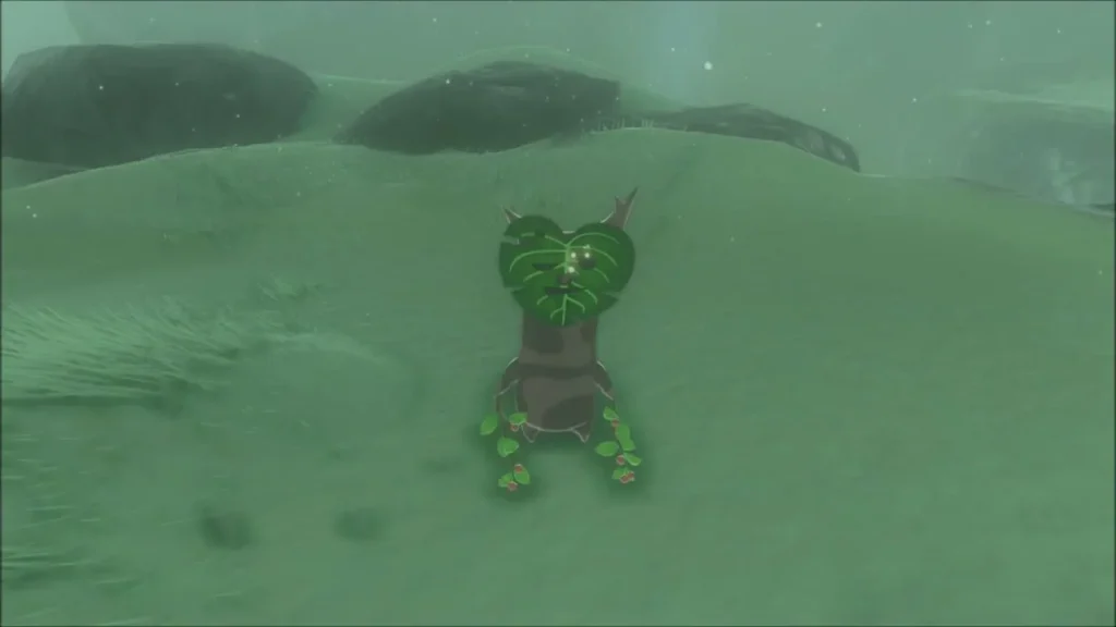 Korok standing on an open grassy slope in the snowy mist Korok standing on an open grassy slope in the snowy mist