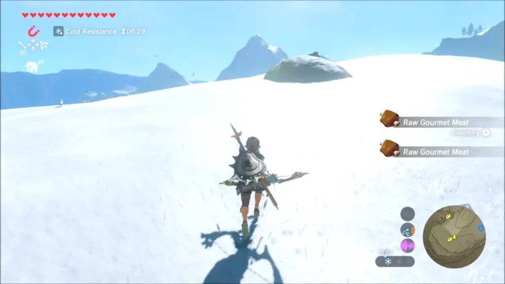 Link running across the snowfield toward a lone boulder Link running across the snowfield toward a lone boulder