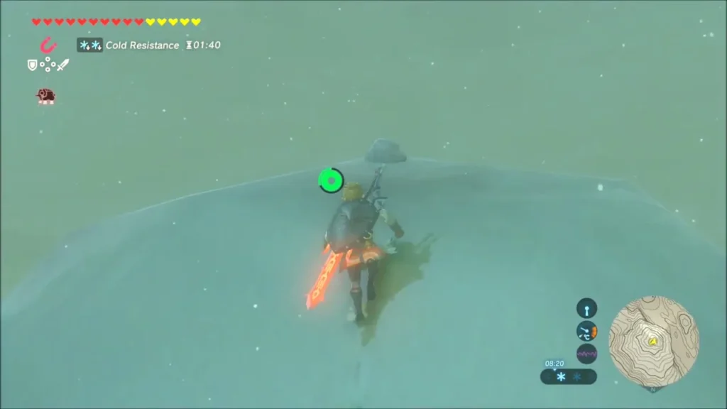 Link on a rounded snowy hilltop beside a small loose rock Link on a rounded snowy hilltop beside a small loose rock