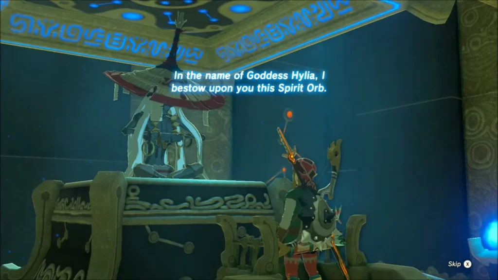 The monk speaking as Link raises his arm at the altar The monk speaking as Link raises his arm at the altar