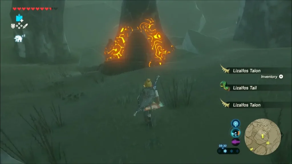 Link approaching the glowing orange shrine entrance in the misty mountain Link approaching the glowing orange shrine entrance in the misty mountain