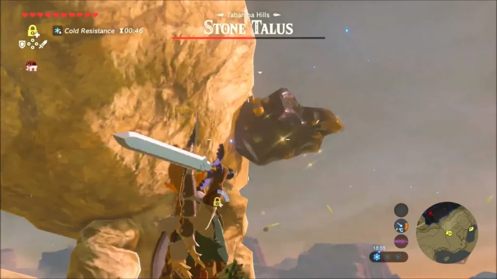 Link hitting the ore on the Stone Talus with a large sword Link hitting the ore on the Stone Talus with a large sword