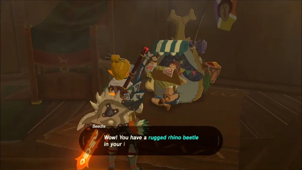 Beedle the traveling merchant at his counter inside the stable Beedle the traveling merchant at his counter inside the stable