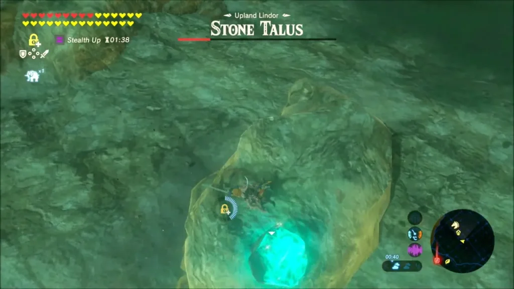 Link striking the glowing weak spot of the Stone Talus with its health nearly gone Link striking the glowing weak spot of the Stone Talus with its health nearly gone