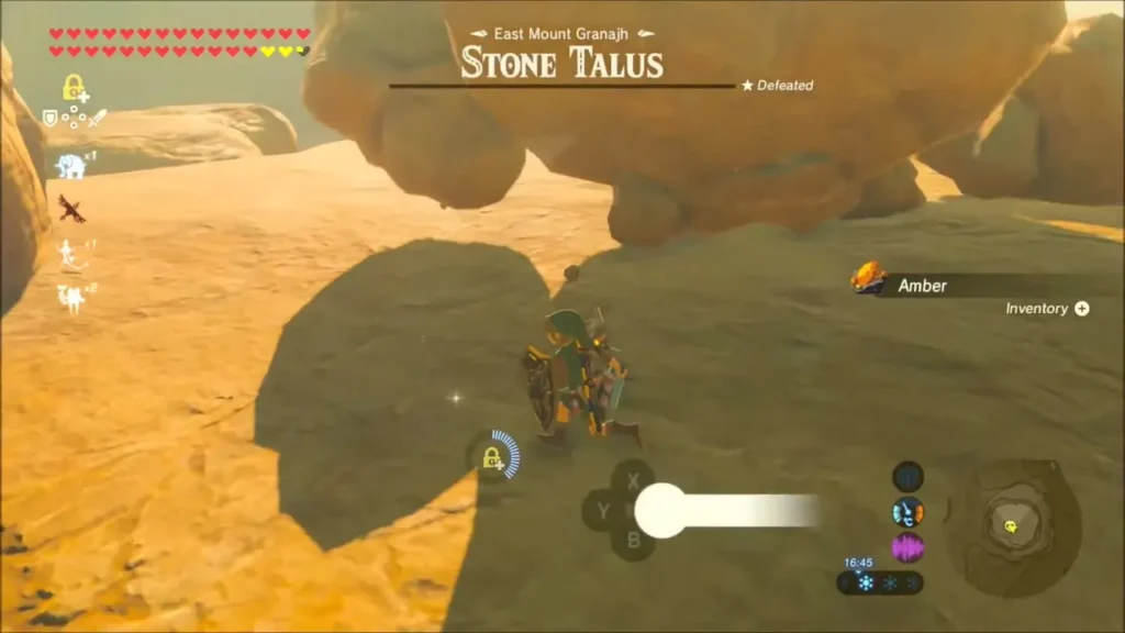 Link walking up to Amber dropped by the defeated Stone Talus Link walking up to Amber dropped by the defeated Stone Talus