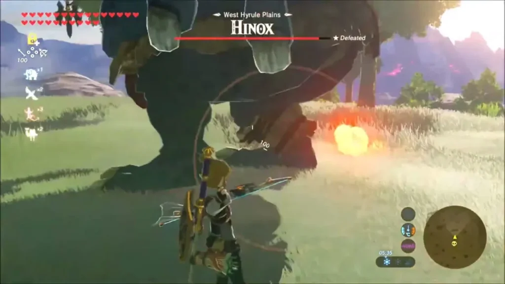 Link with bow drawn before a Hinox as grass burns nearby Link with bow drawn before a Hinox as grass burns nearby