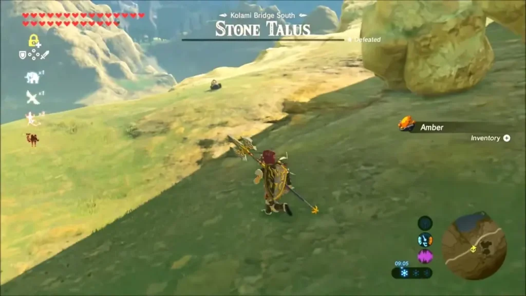 Link walking down the slope to collect Amber from the defeated Talus Link walking down the slope to collect Amber from the defeated Talus