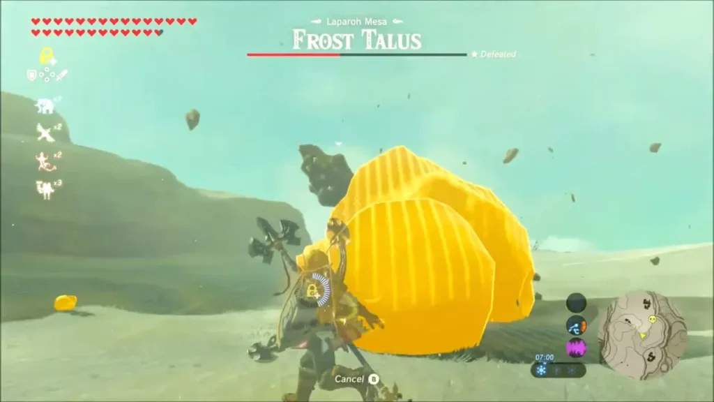 Link beside a stunned yellow-glowing Frost Talus on the snow Link beside a stunned yellow-glowing Frost Talus on the snow