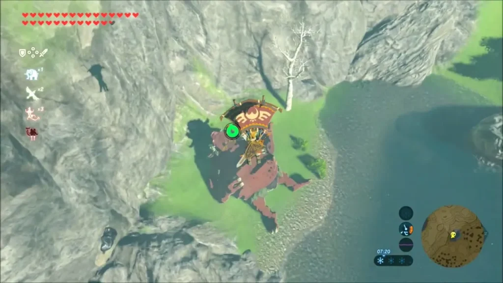 Link gliding down toward a sleeping Hinox beside Purifier Lake Link gliding down toward a sleeping Hinox beside Purifier Lake