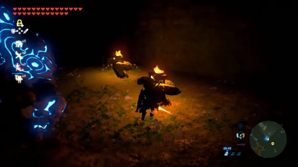 Link in the nearly pitch dark Thyphlo Ruins lit by torches Link in the nearly pitch dark Thyphlo Ruins lit by torches