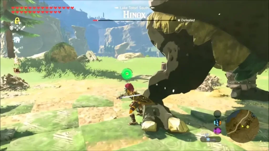 Link attacking the downed Hinox at Lake Totori South Link attacking the downed Hinox at Lake Totori South